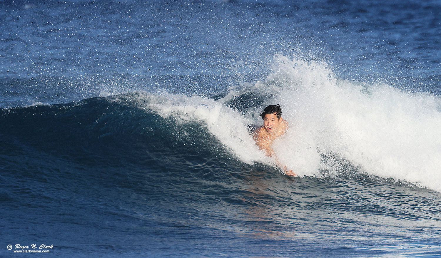 image surfer-hawaii-rnclark-c02-2022-4C3A4265.b-1500s.jpg is Copyrighted by Roger N. Clark, www.clarkvision.com