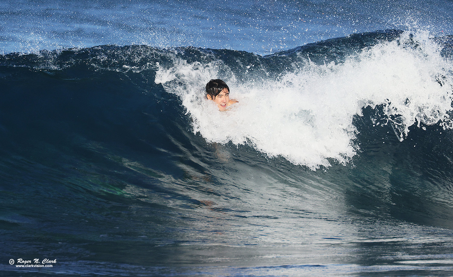 image surfer-hawaii-rnclark-c02-2022-4C3A4311.b-1500s.jpg is Copyrighted by Roger N. Clark, www.clarkvision.com